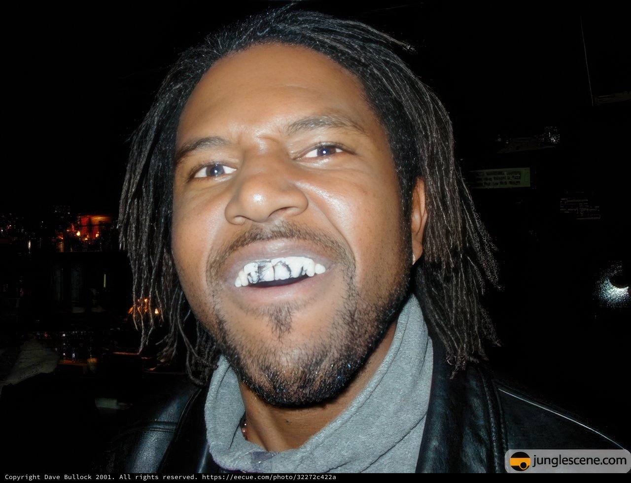 Dreadlocked Man with a Smile