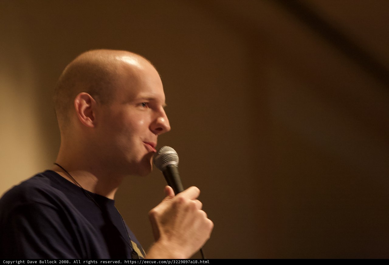 Bald Entertainer Takes the Stage