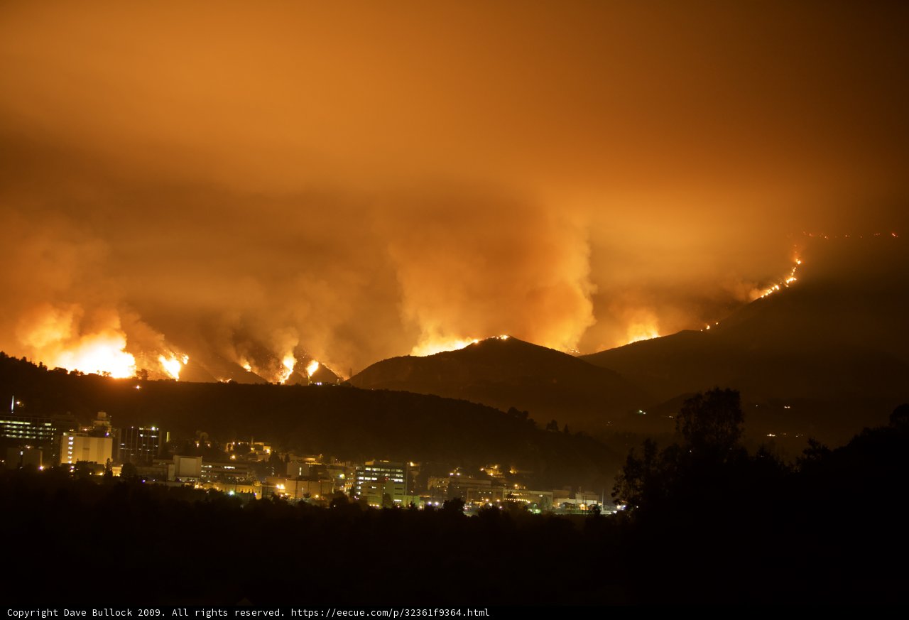 Flames Engulf Hills Above City