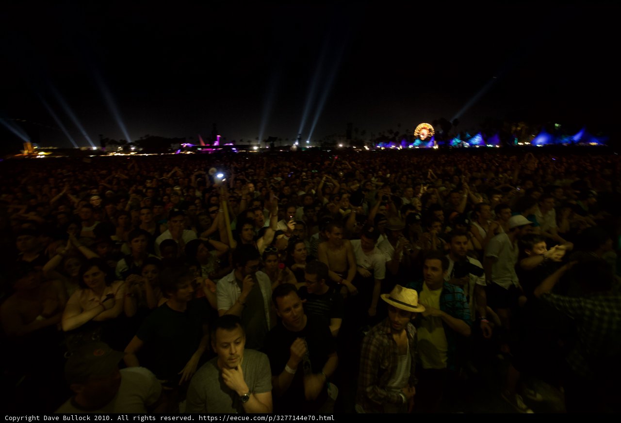 Night sky lit up by concert crowd