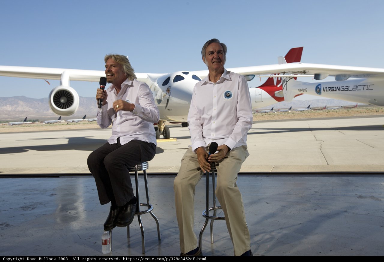 Aviation Legends Burt Rutan and Richard Branson in Front of Airplane