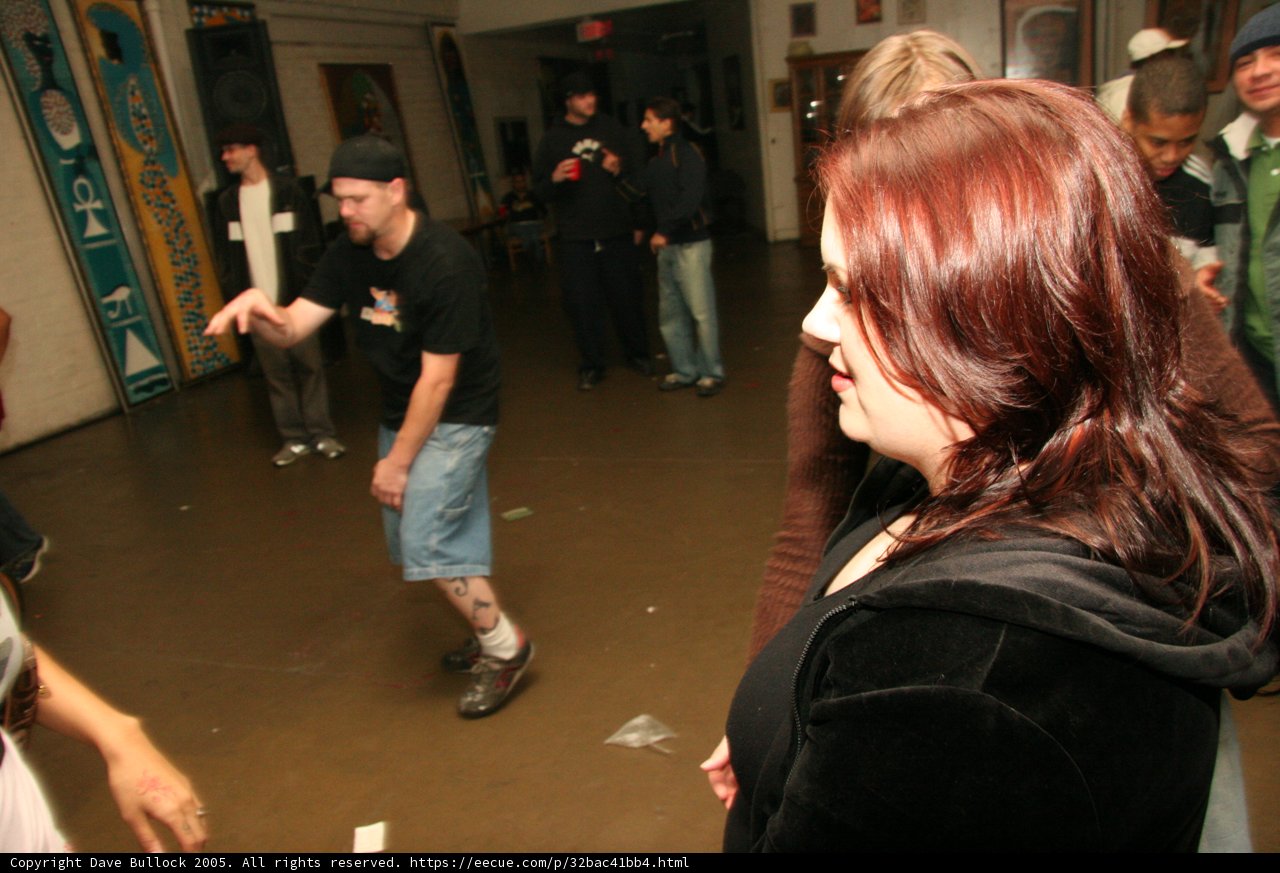 Red-haired woman takes center stage on the dance floor