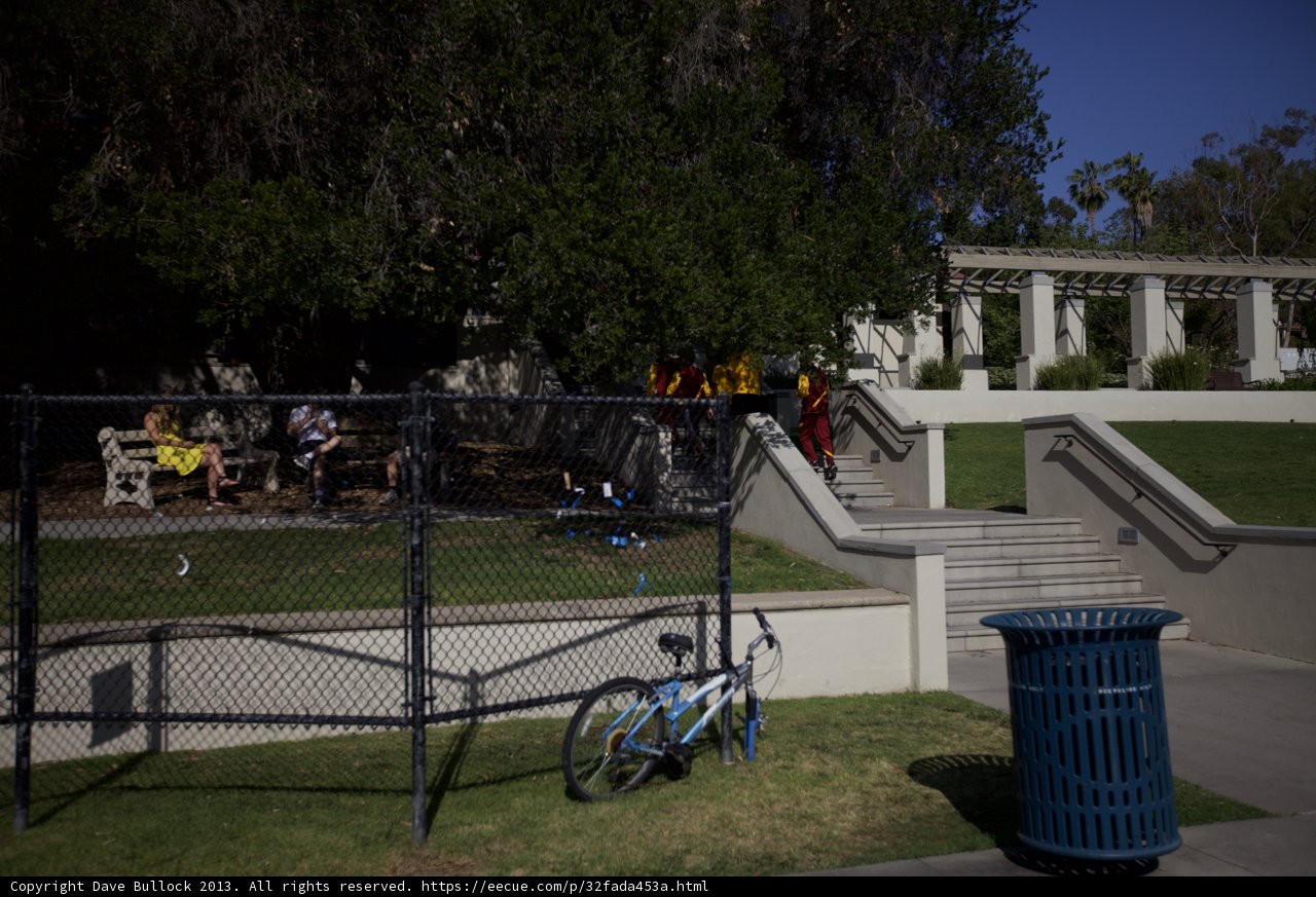 Parked Bike against Fenced Background