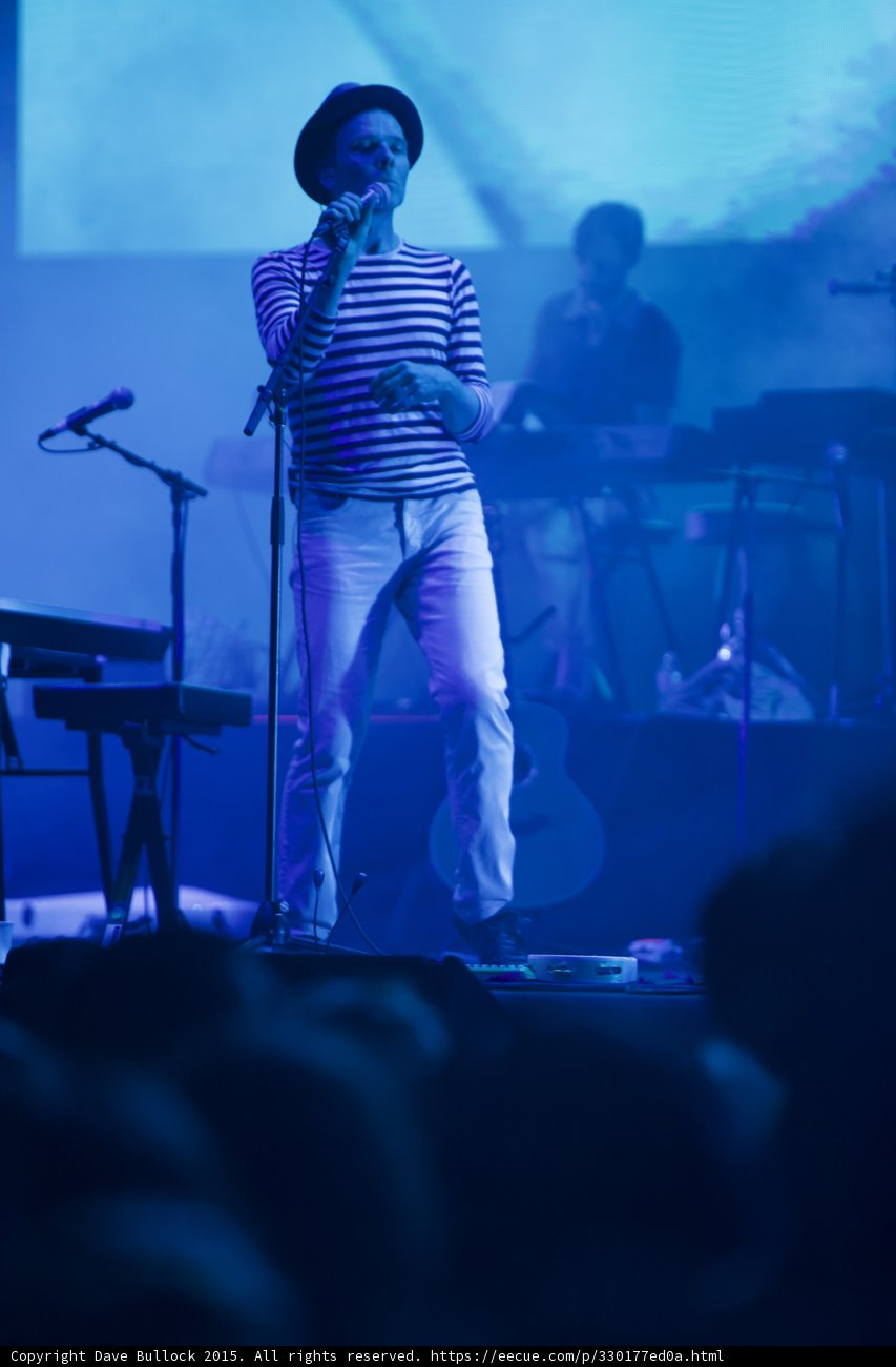 Belle and Sebastian Stuart Murdoch Singing Handheld Mic Fedora Striped Shirt Blue Haze Band