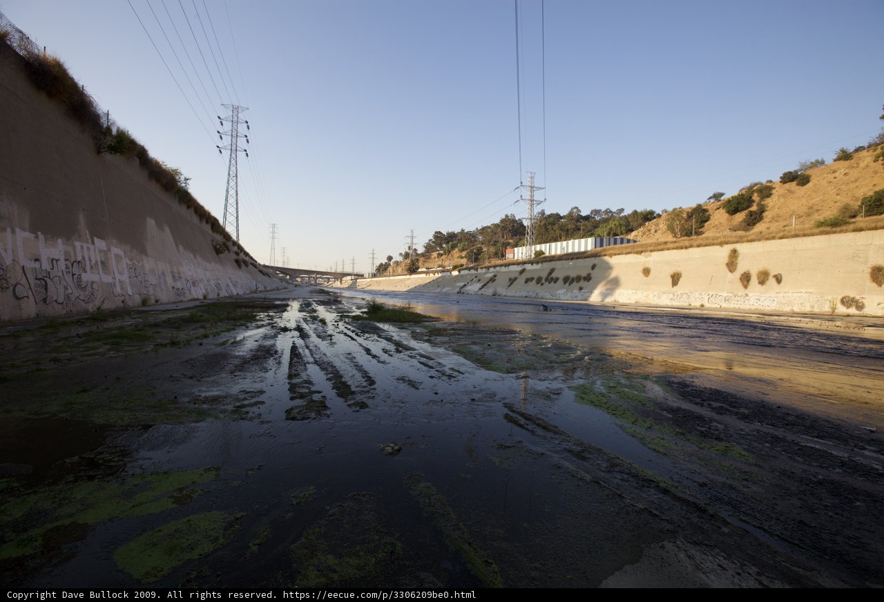 Algae-Filled River in the Heart of the City