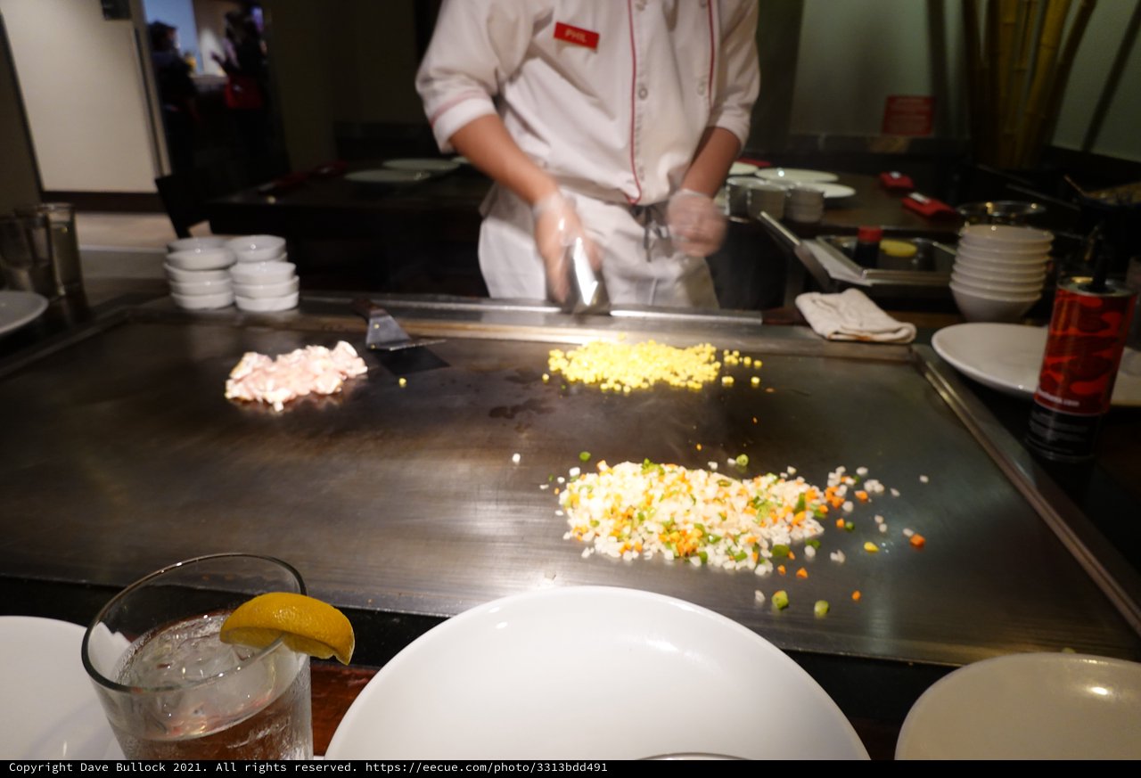 Teppanyaki Chef Cooking at Japanese Hibachi Grill