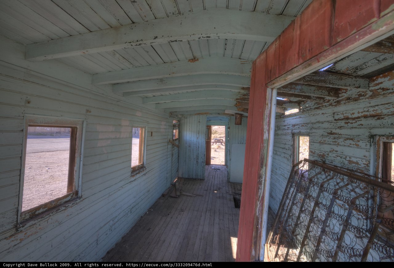 Inside a Train Car with a Wooden Floor
