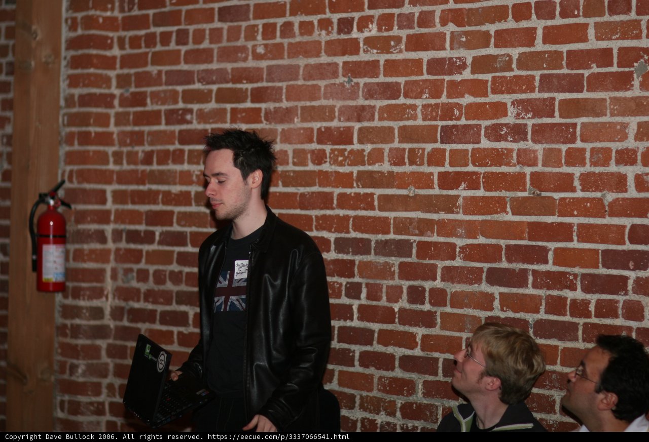 Three Men and a Brick Wall