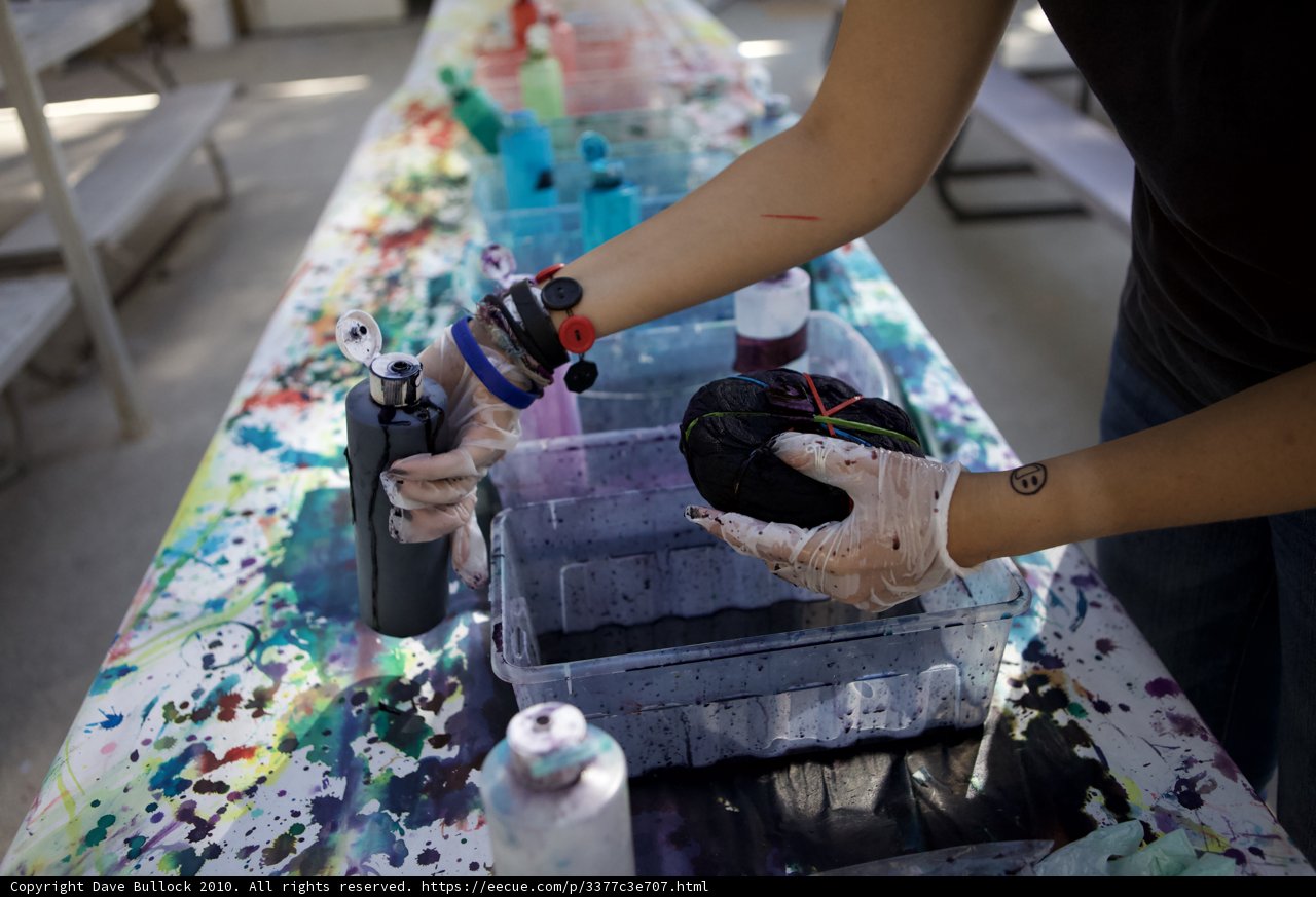 Painting a table at wbtla camp