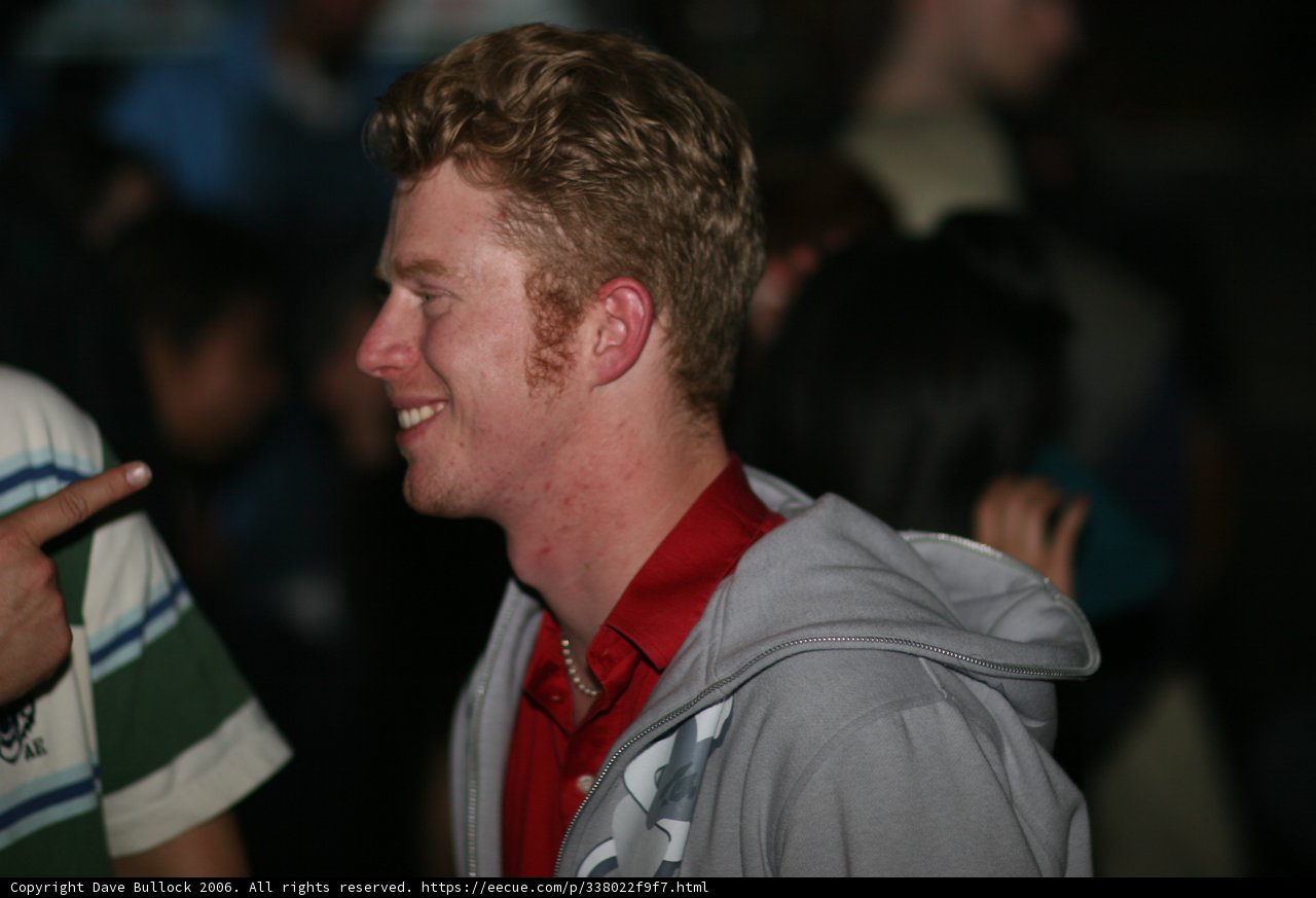 Happy Man in Red Shirt