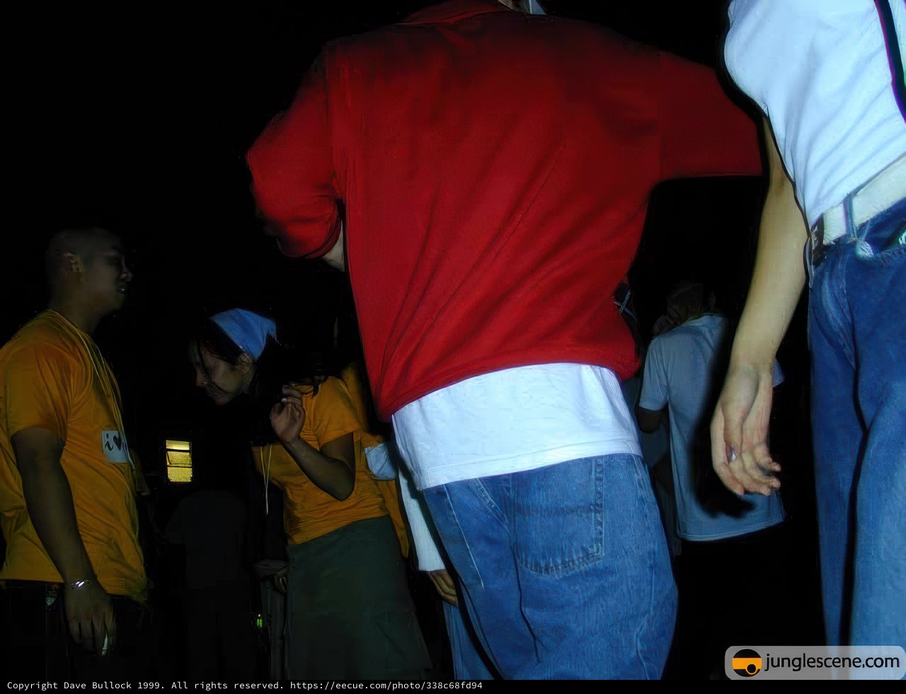 Red-Shirted Man in a Group