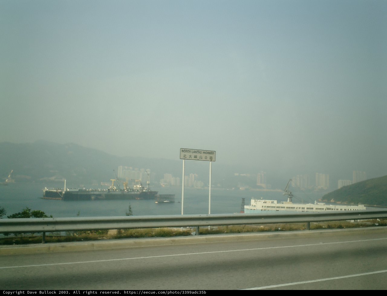 Ship and Highway View from a Car