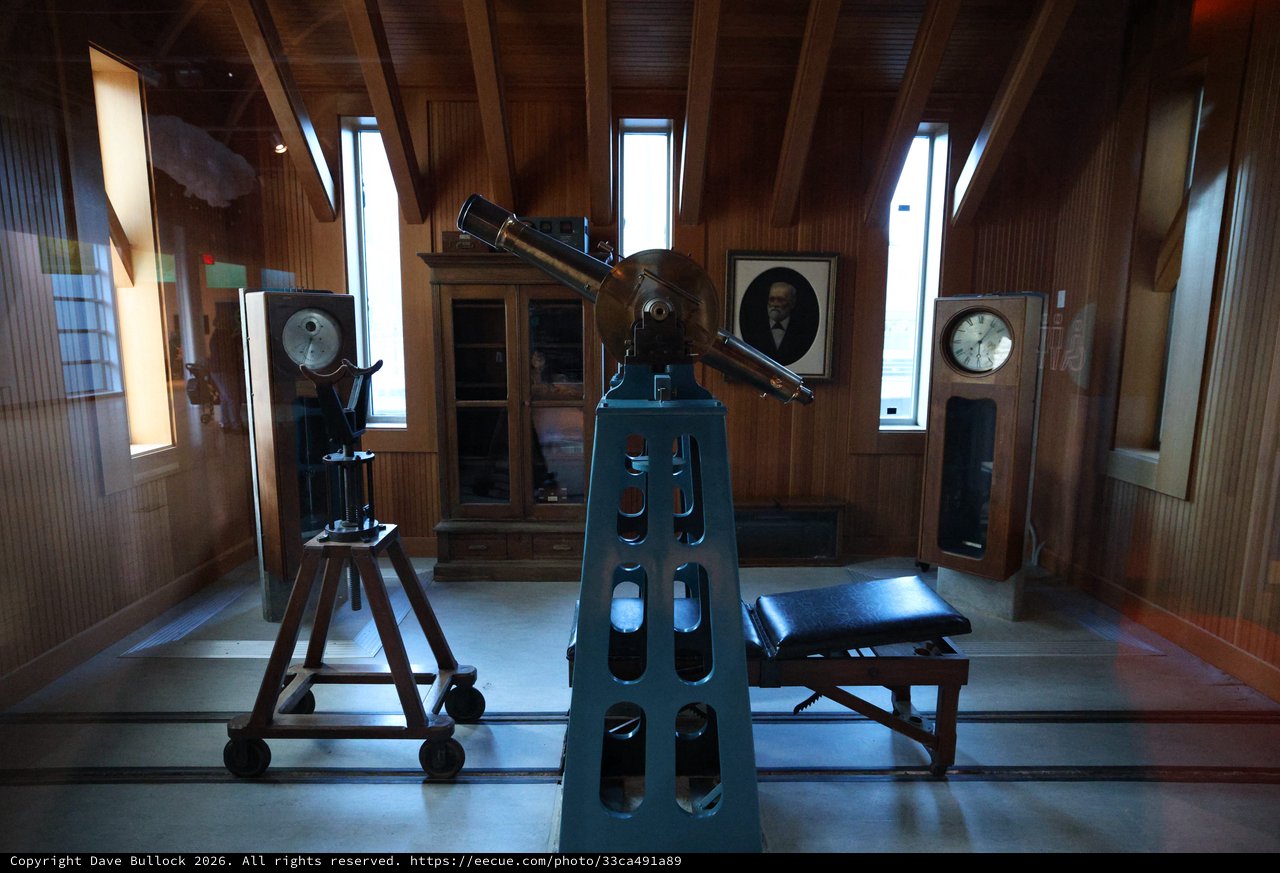 Historic Observatory Interior with Vintage Telescopes