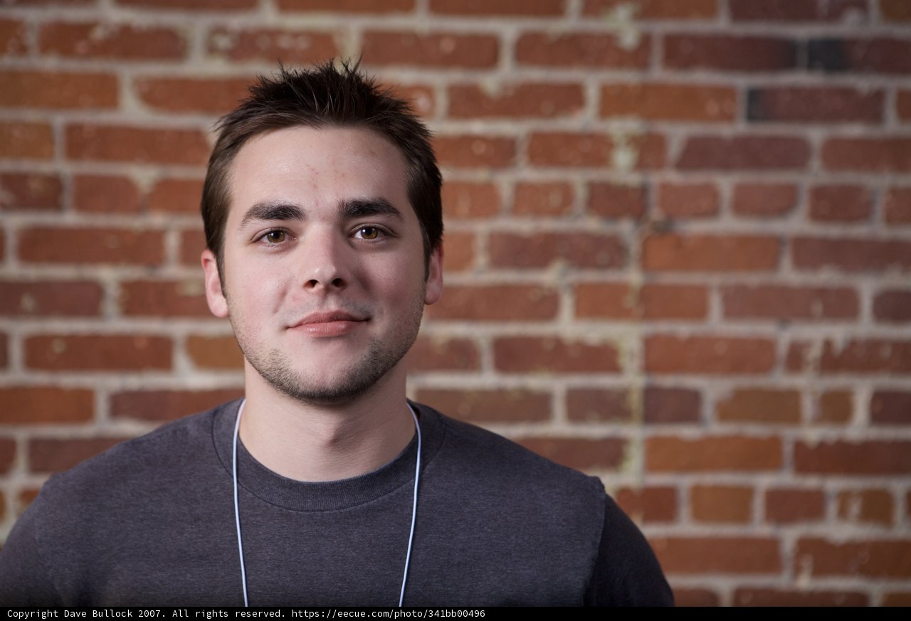 Gray-Shirted Man with a Smile