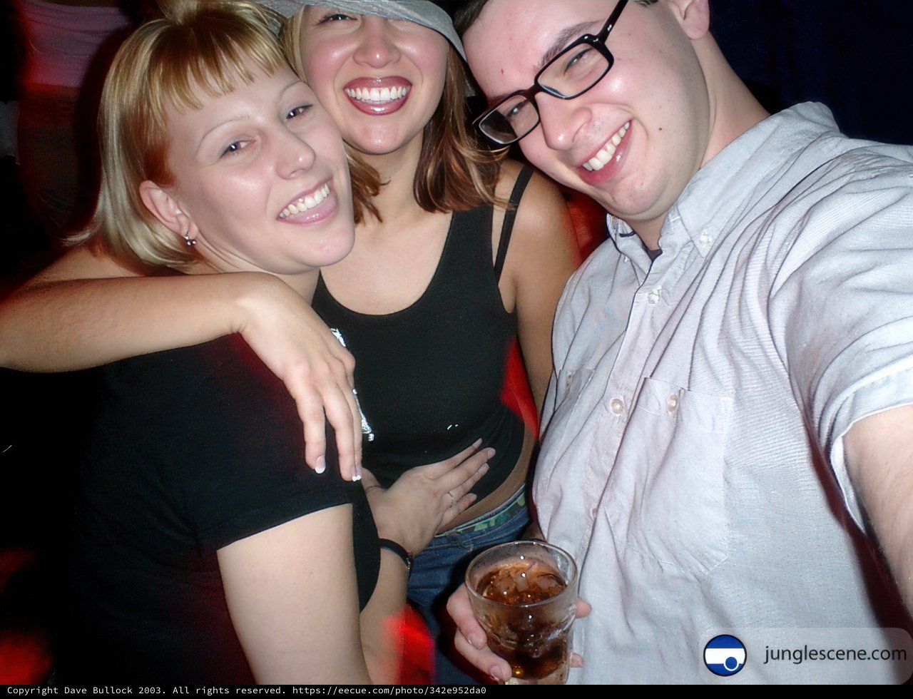 Posing with Glasses and Beverages