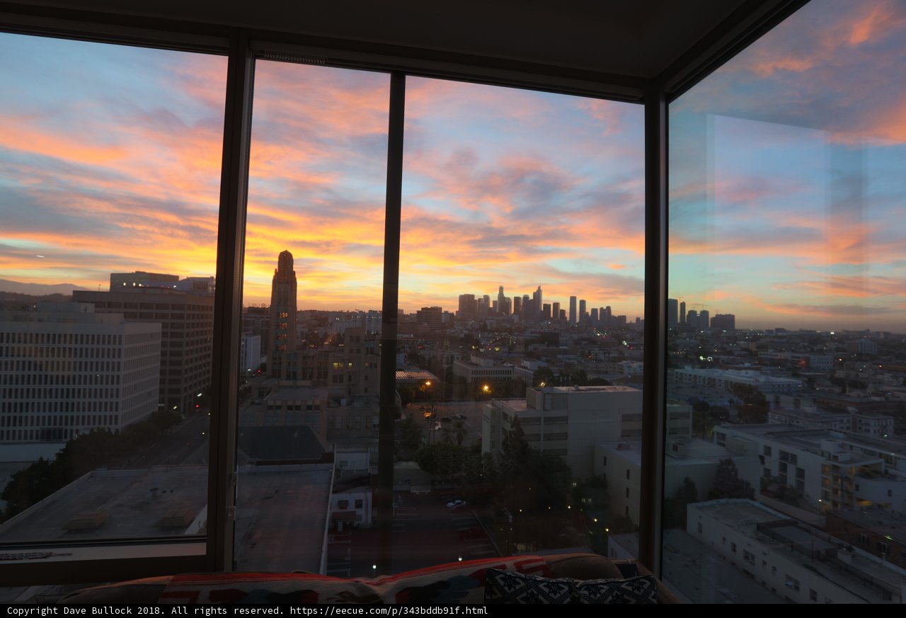 Urban Sunset from a High-Rise Window