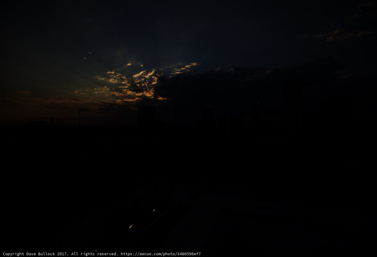 Radiant Sunset over the Urban Skyline