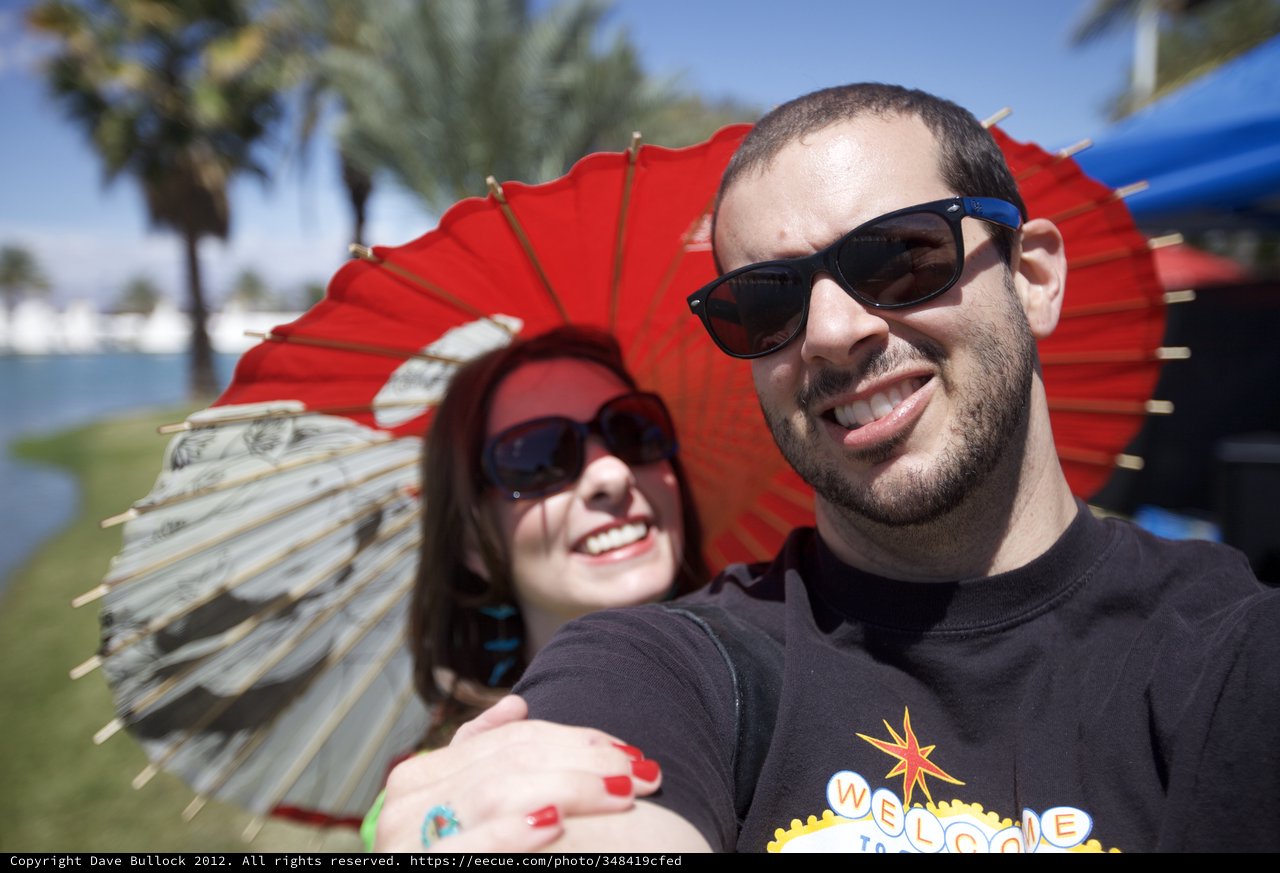 Couple Selfie with Red Parasols at Coachella 2012