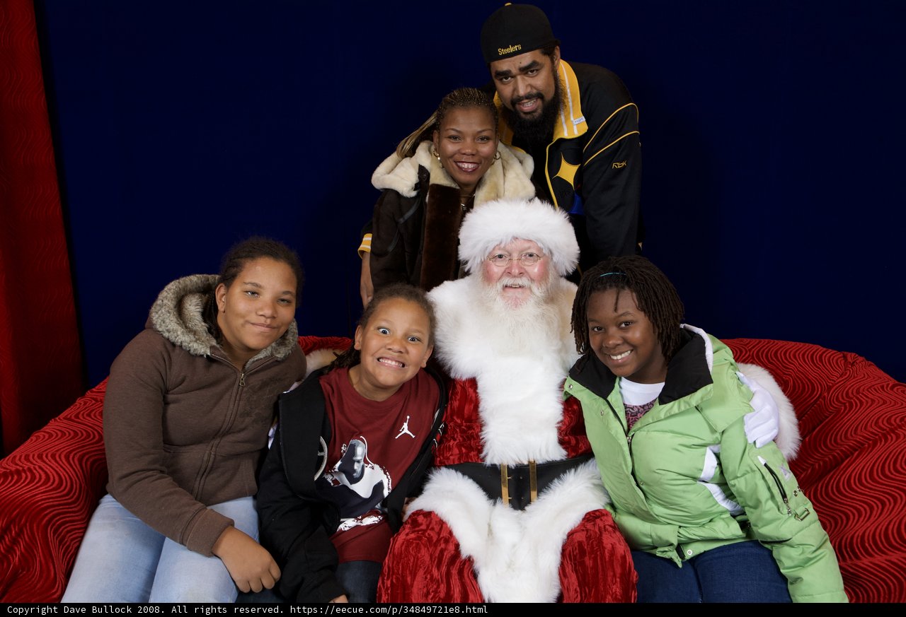A Festive Family Photo with Santa Claus