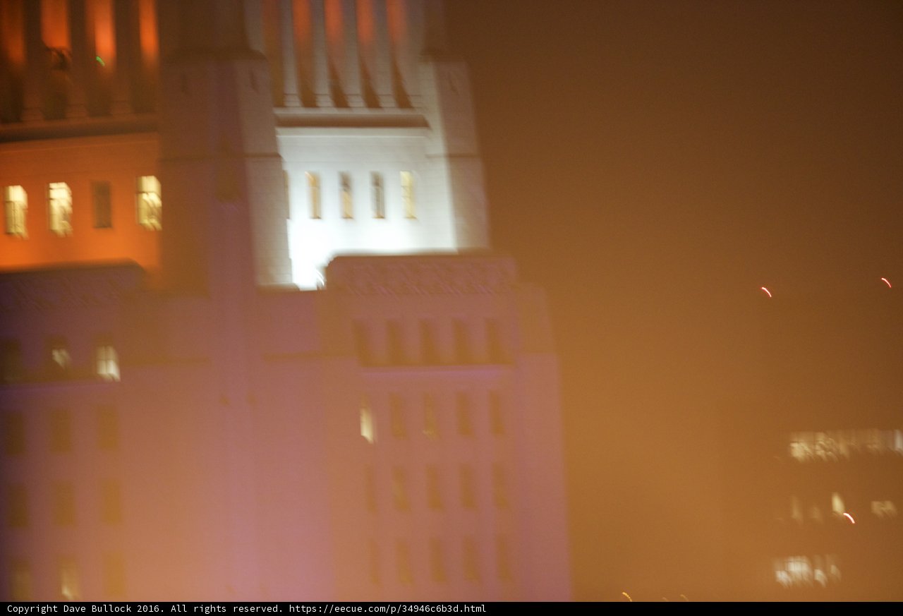 The Glowing City Hall in the Fog