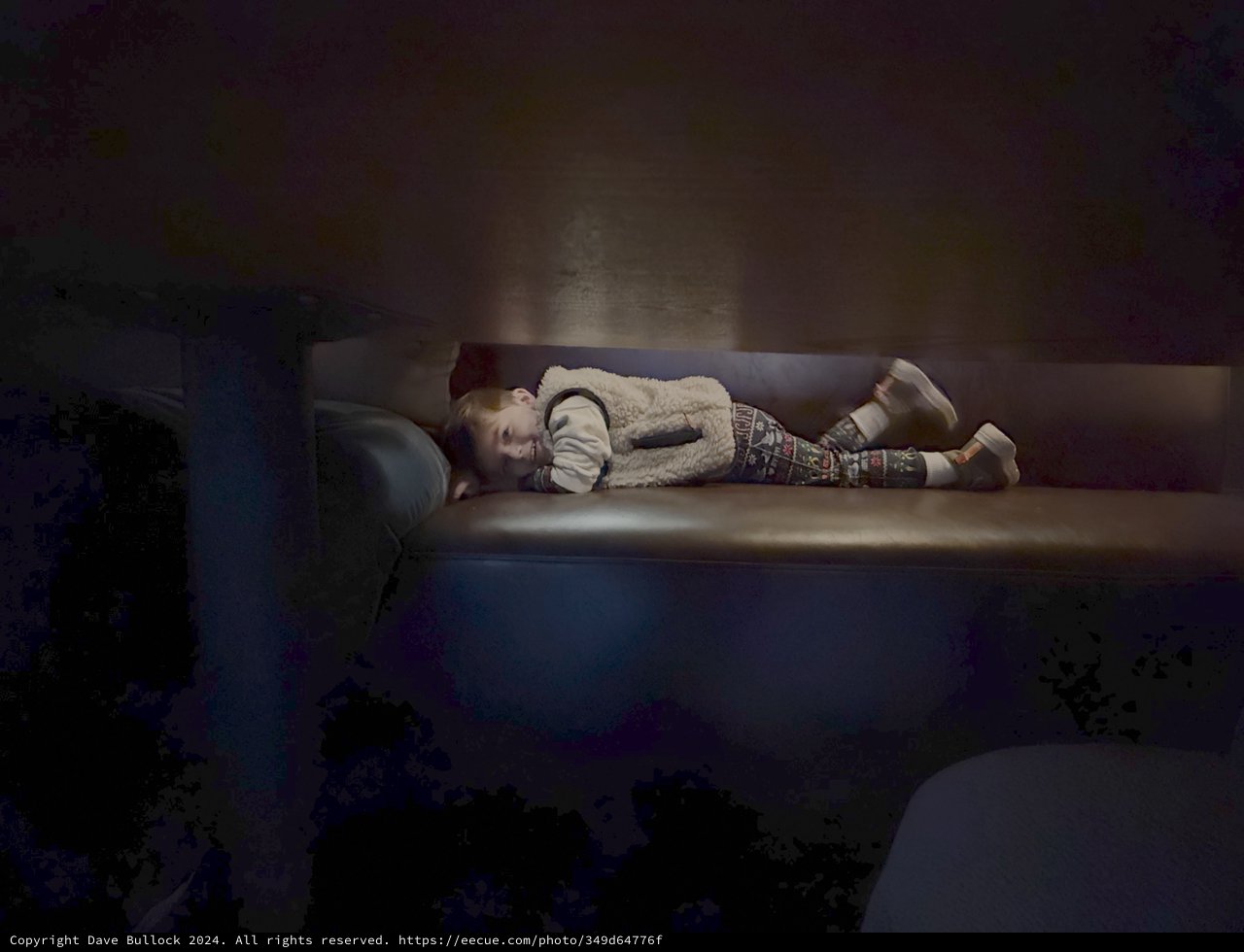 Child Sleeping Peacefully on Living Room Couch