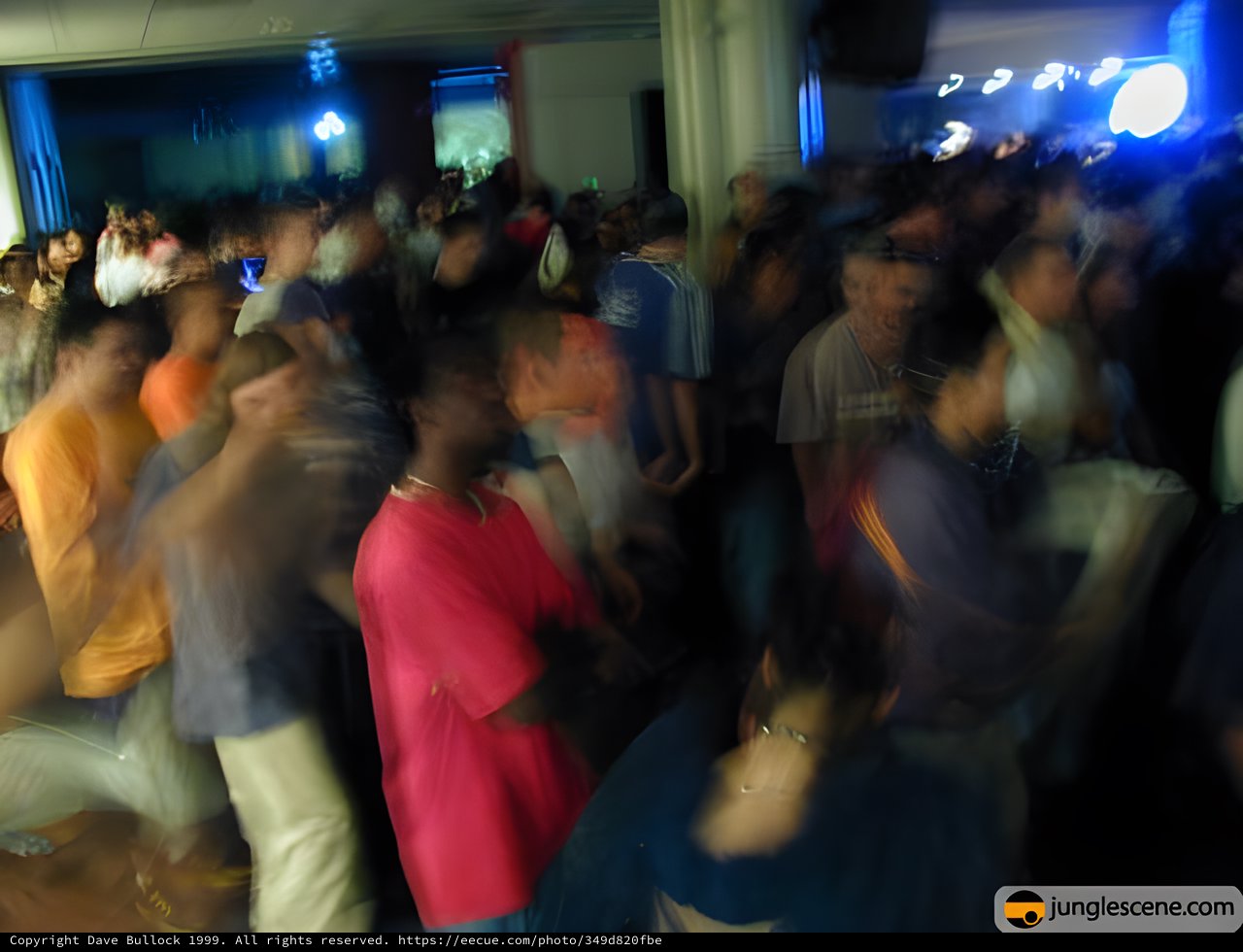 Energetic Dance Floor at 1990s Rave Event