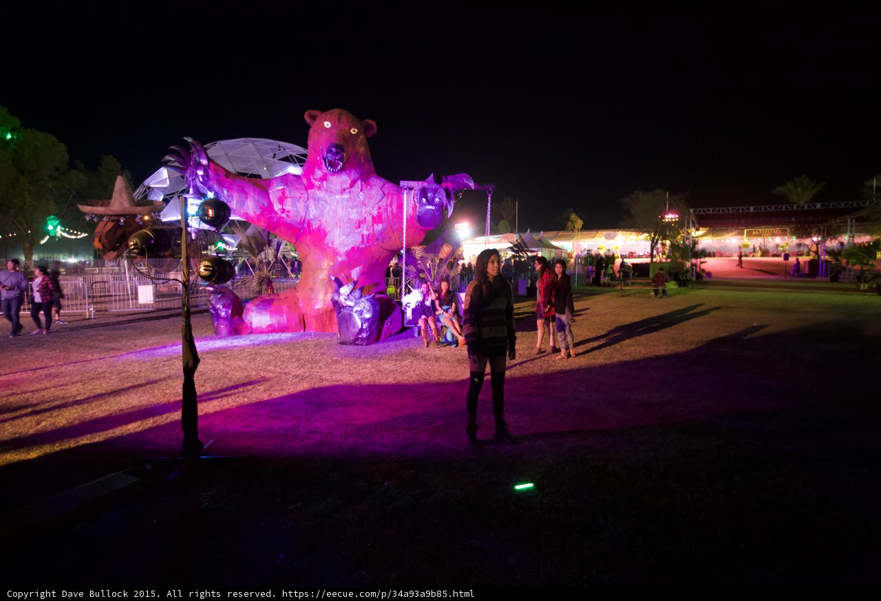 Woman Poses with Pink Bear