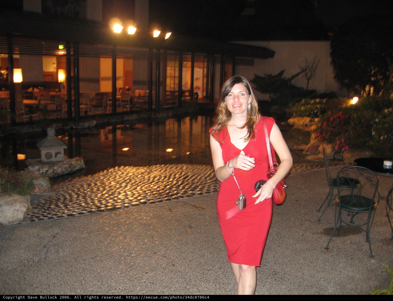 Elegant Woman in Red at New Otani Hotel Garden