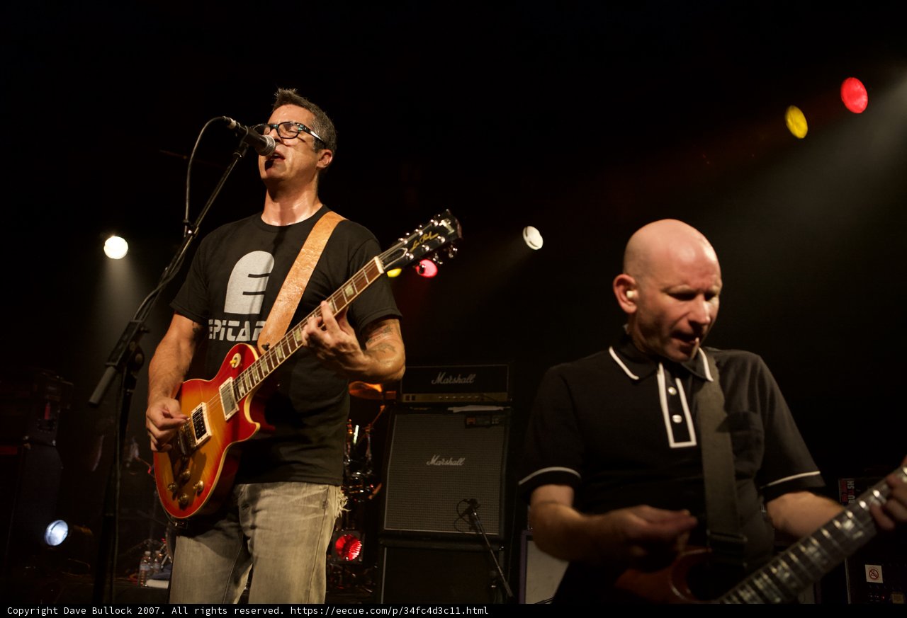 Two Men Jamming on Stage