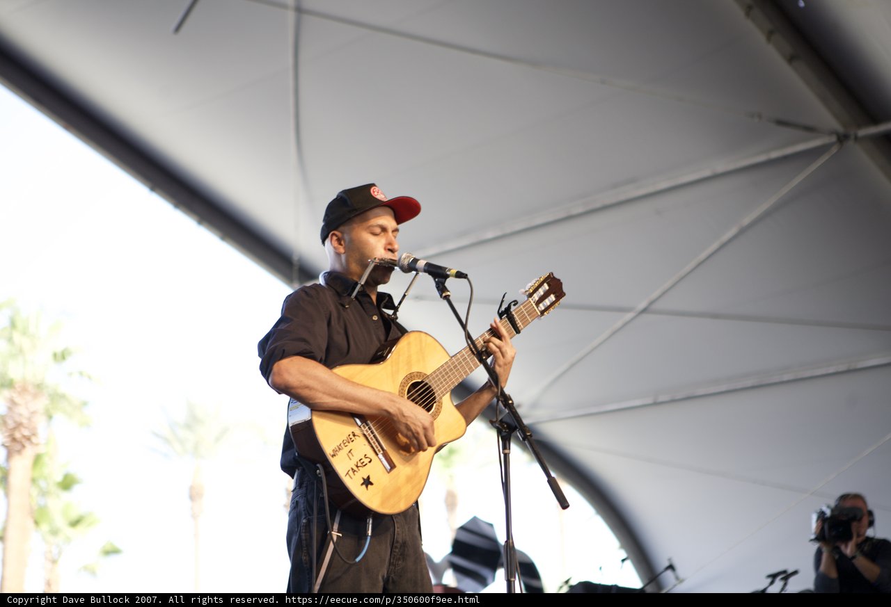 Tom Morello Rocks the Stage with his Guitar and Microphone