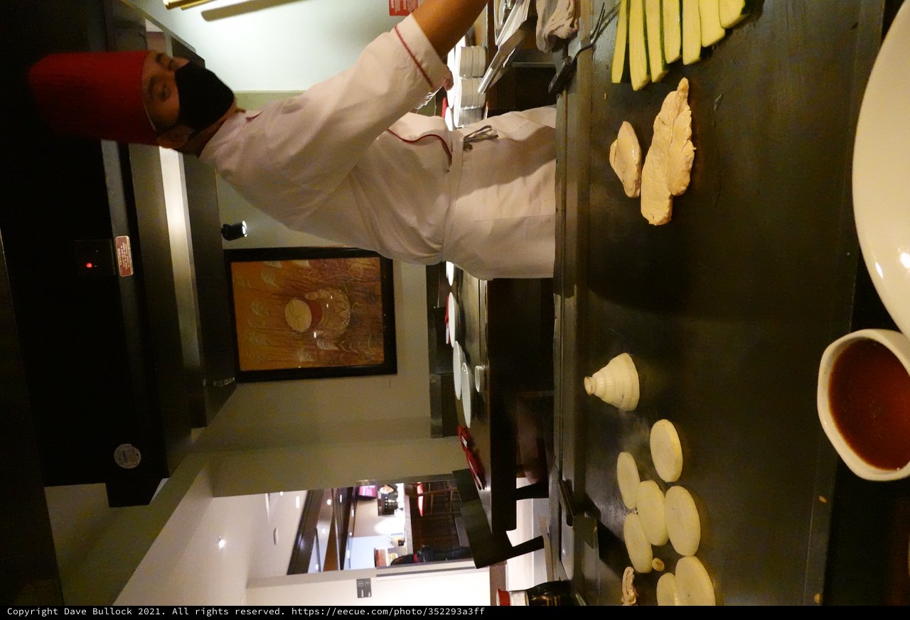 Teppanyaki Chef Cooking at Japanese Grill