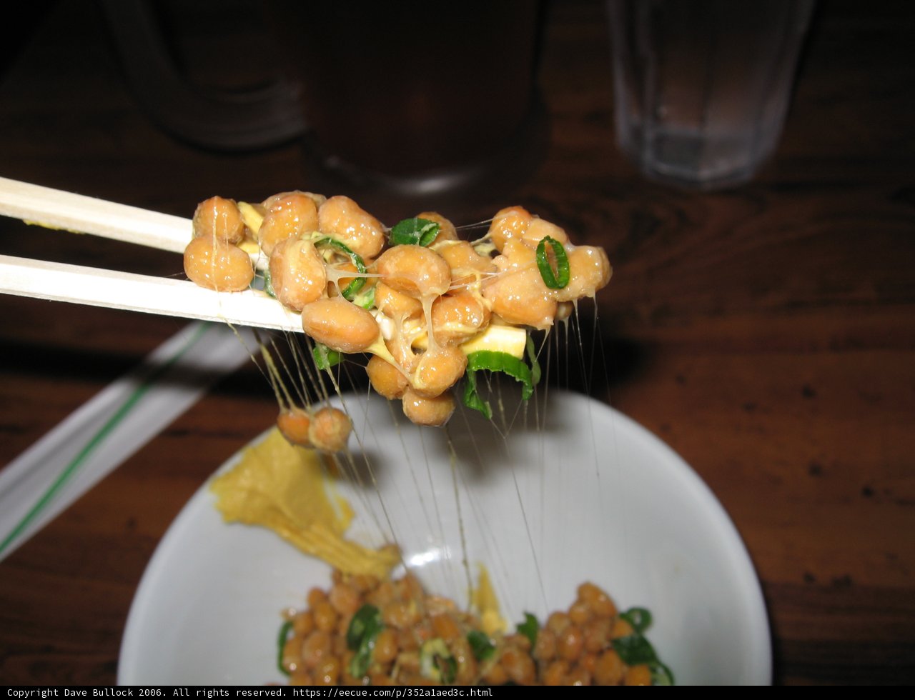 Chopsticks Holding Delicious Food