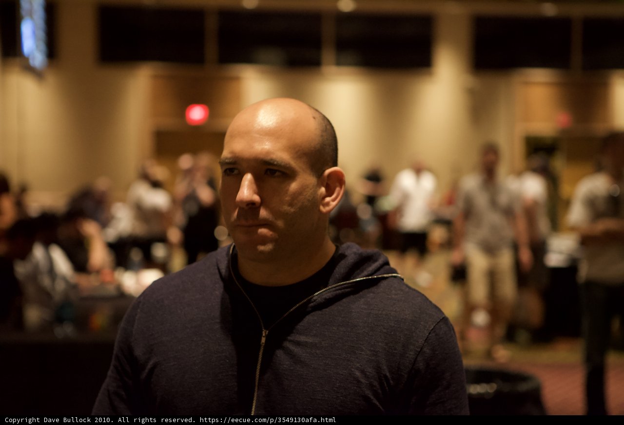 Bald Man in Blue Shirt