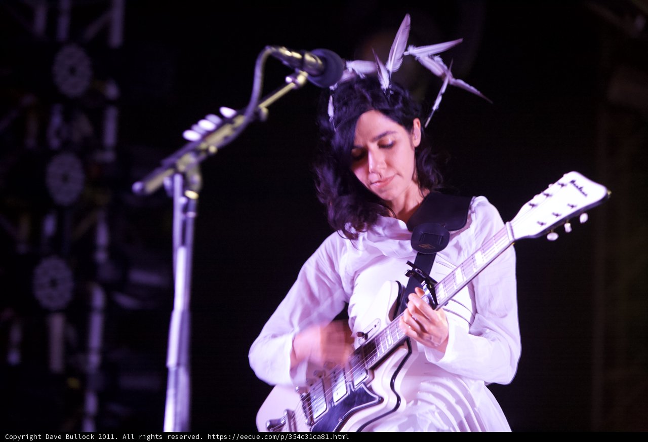 PJ Harvey Rocks the Stage with her Electric Guitar
