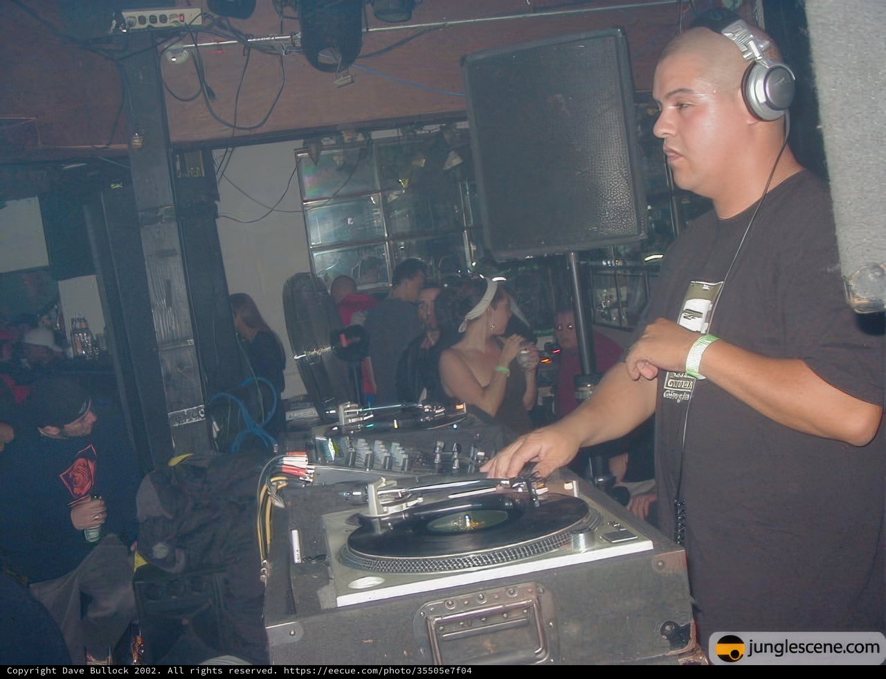 Black-Shirted DJ Setting the Beat