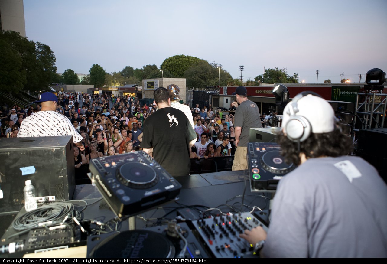 DJ Sven Kwiatkowski Plays to a Vibrant Crowd Against a Blue Sky