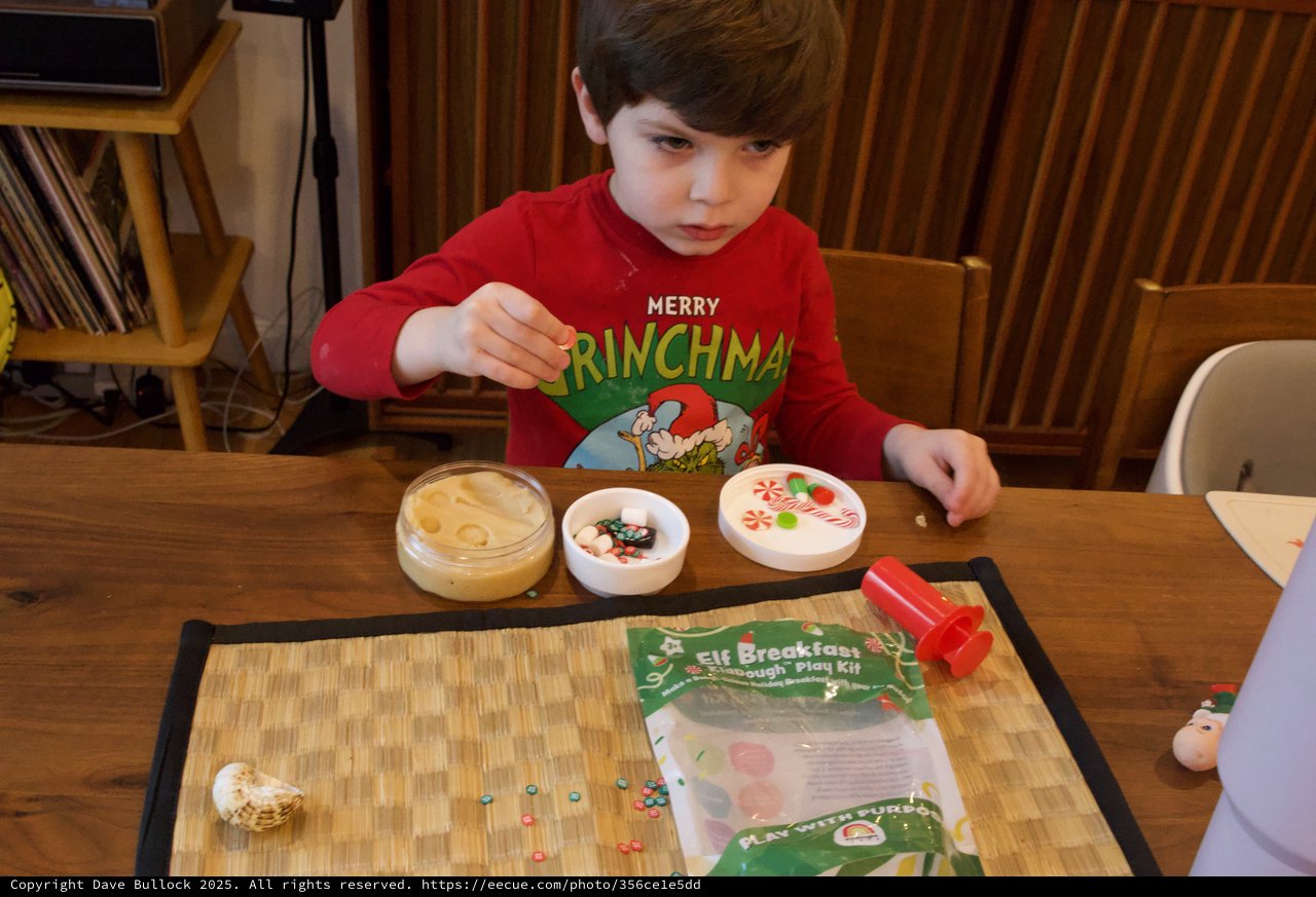 Child Playing with Elf Breakfast Play Dough Kit