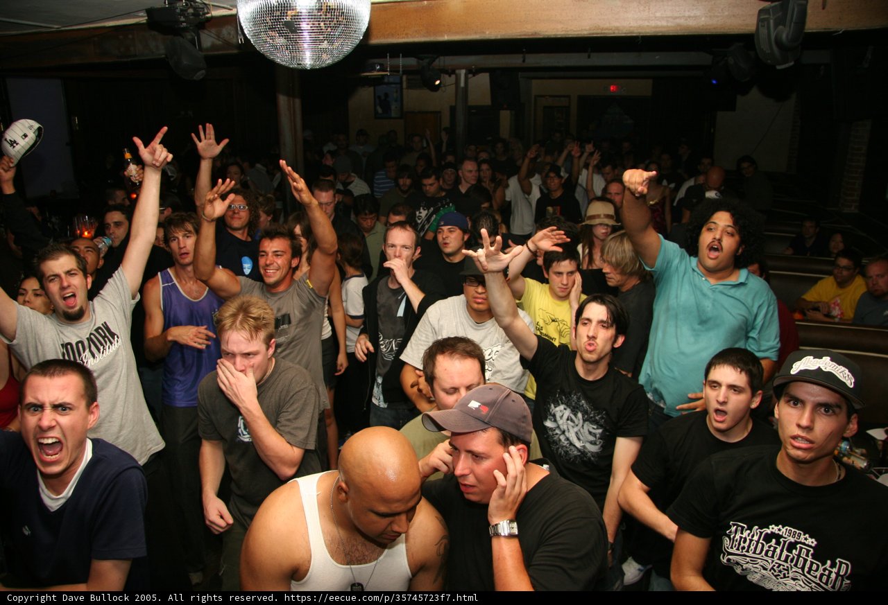 Party Goers with Wild Hands