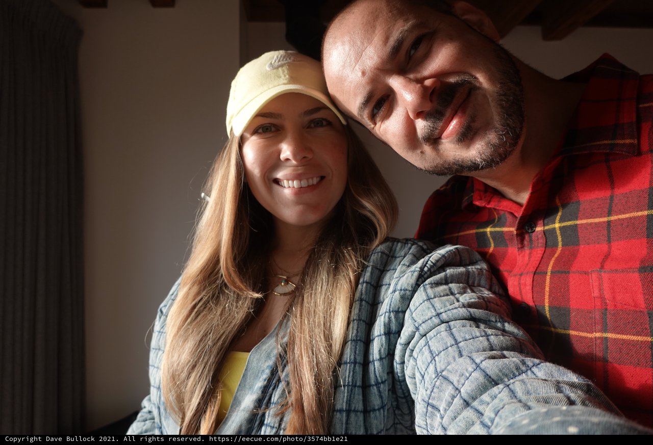 Happy Couple Taking Selfie Together Indoors