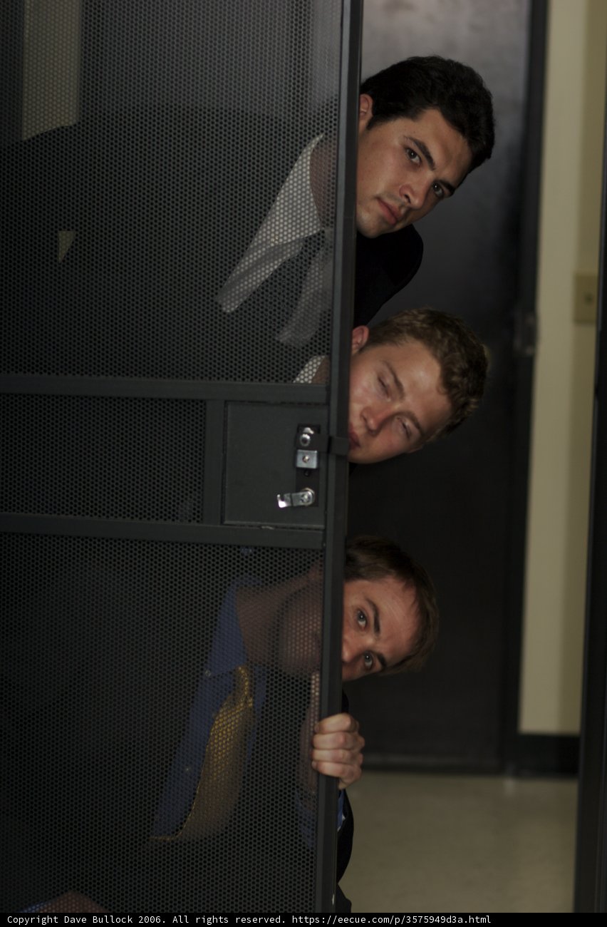 Three Men in Deep Discussion