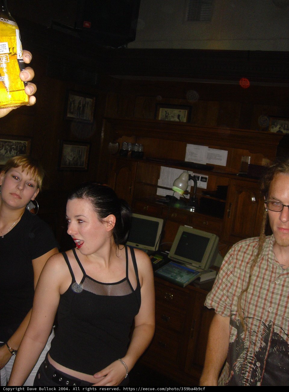 Man with Yellow Box at Pub