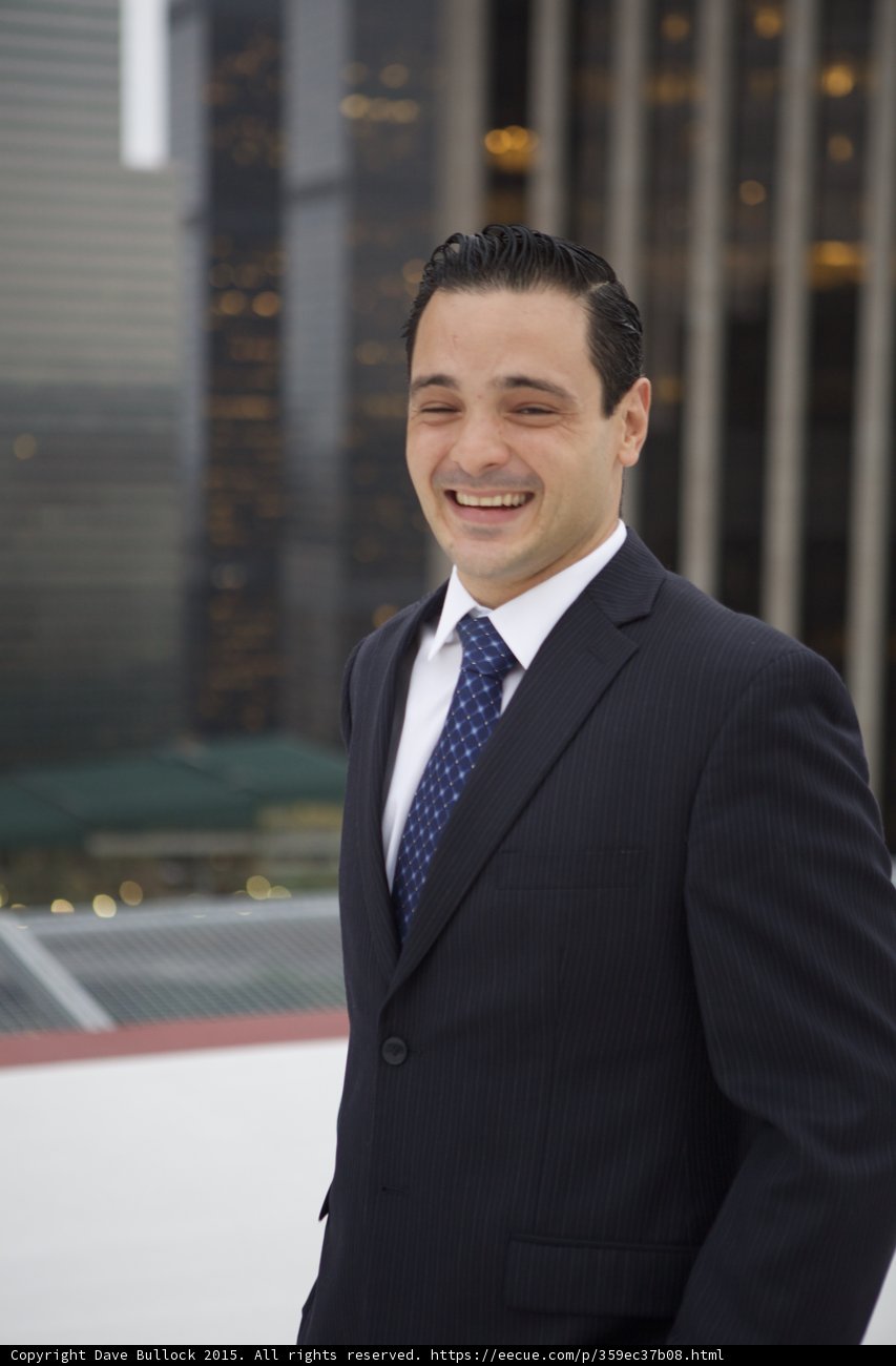 The Suited Smiler