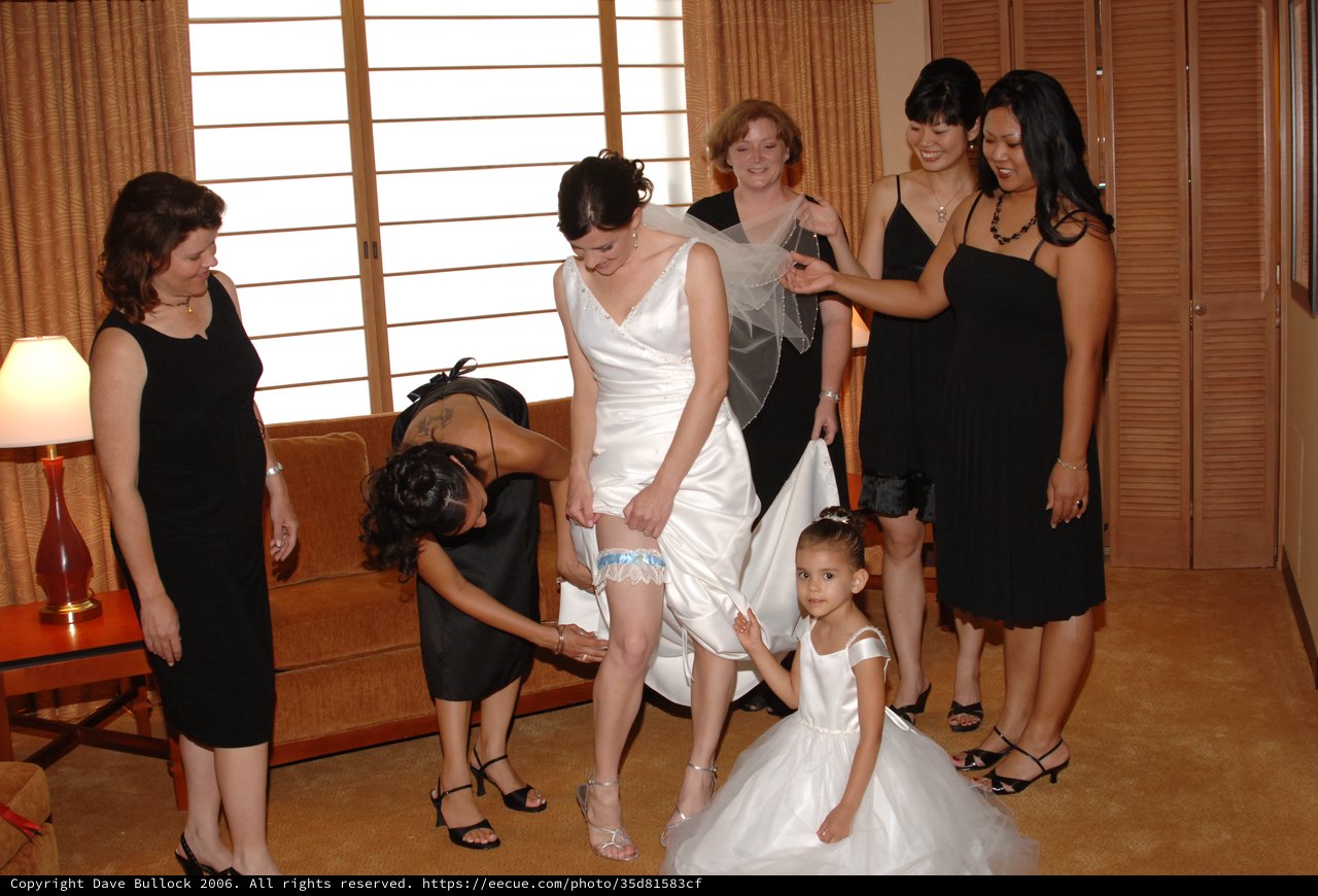Bride Getting Garter Placed Before Wedding Ceremony