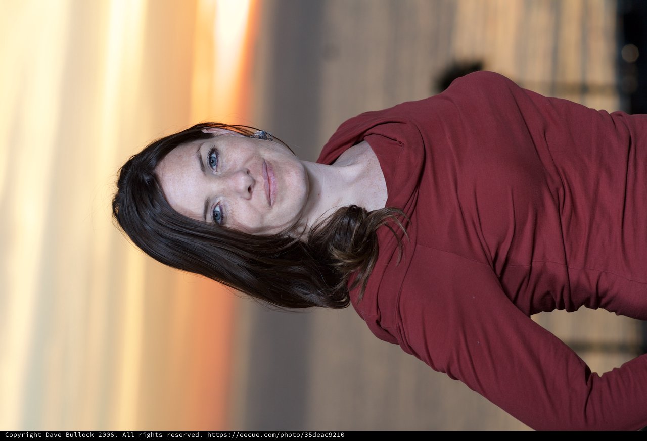 Woman in Red at Golden Hour Seaside