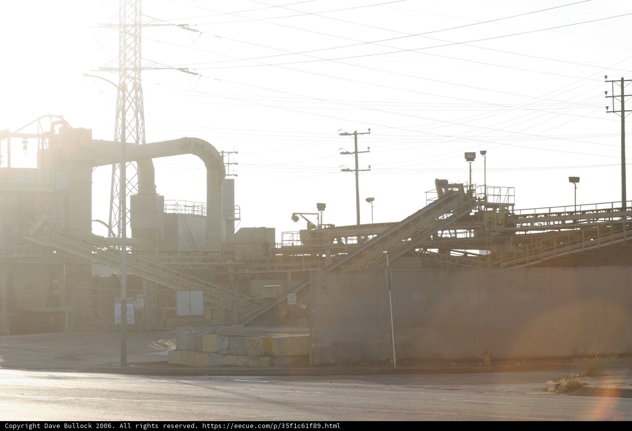 Towering Factory with Conveyor Belt