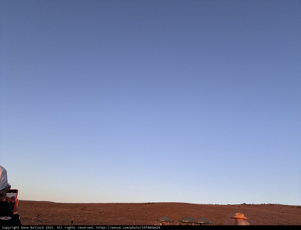 Blue Vault Over Desert Dunes: A Skyward Journey