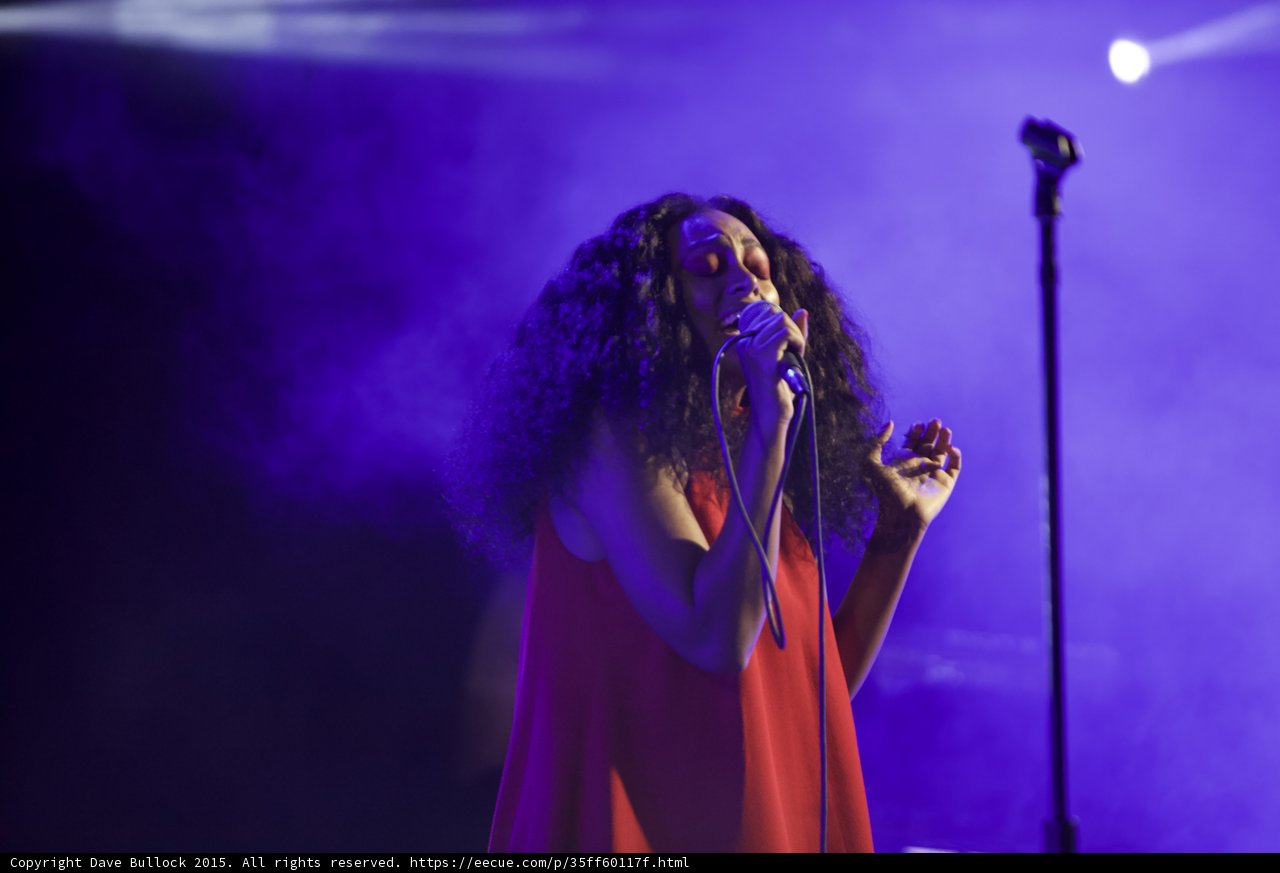Solange Singing Eyes Closed Hand Raised Emotional Purple