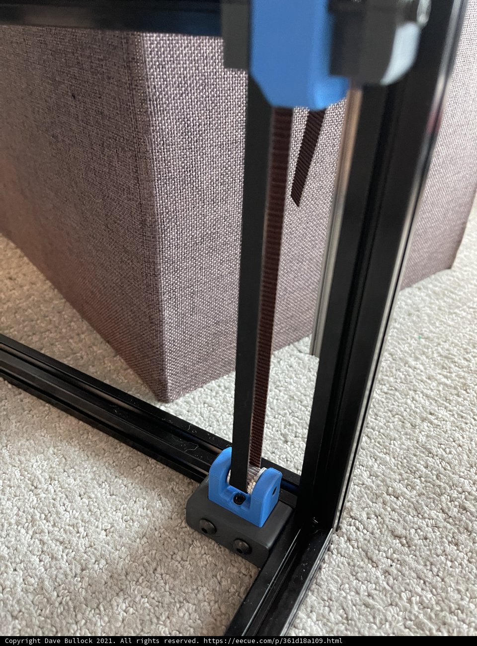 Innovative 3D Printer Next to a Cozy Couch