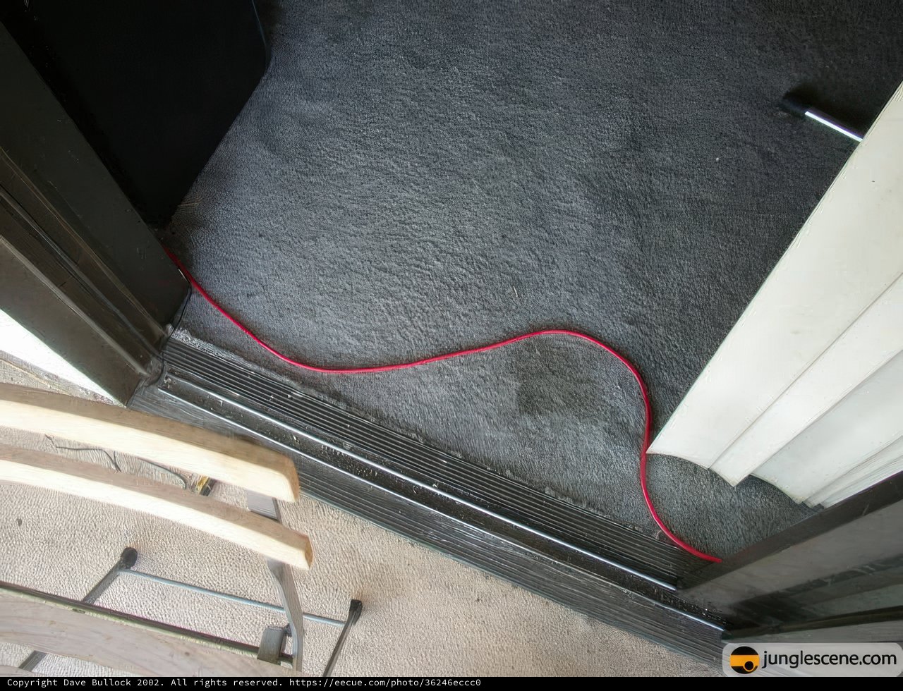 Red Cord Connected to Door Handle