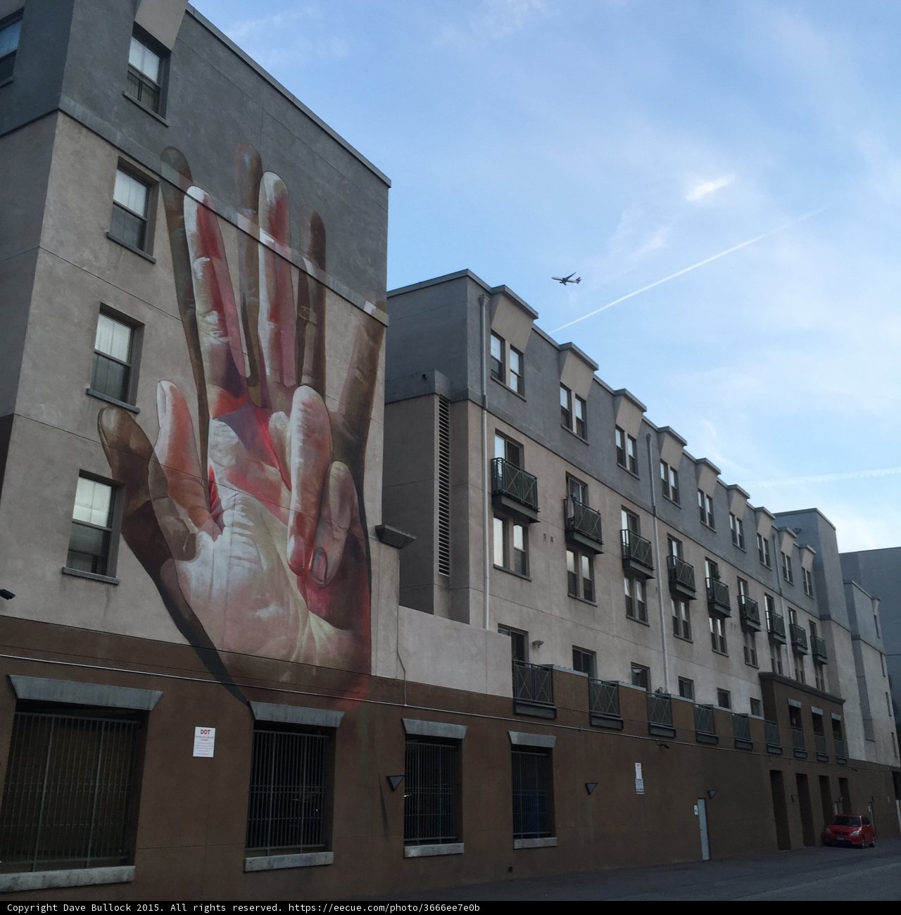 Hand Mural with Airplane